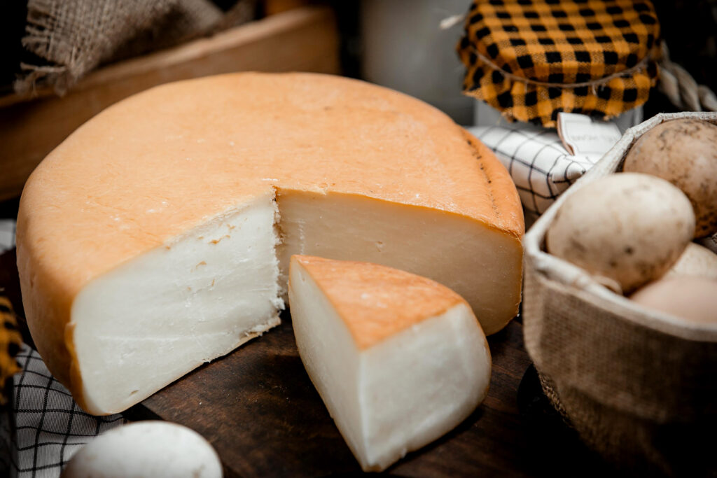 smoked cheese on a tree hemp top view